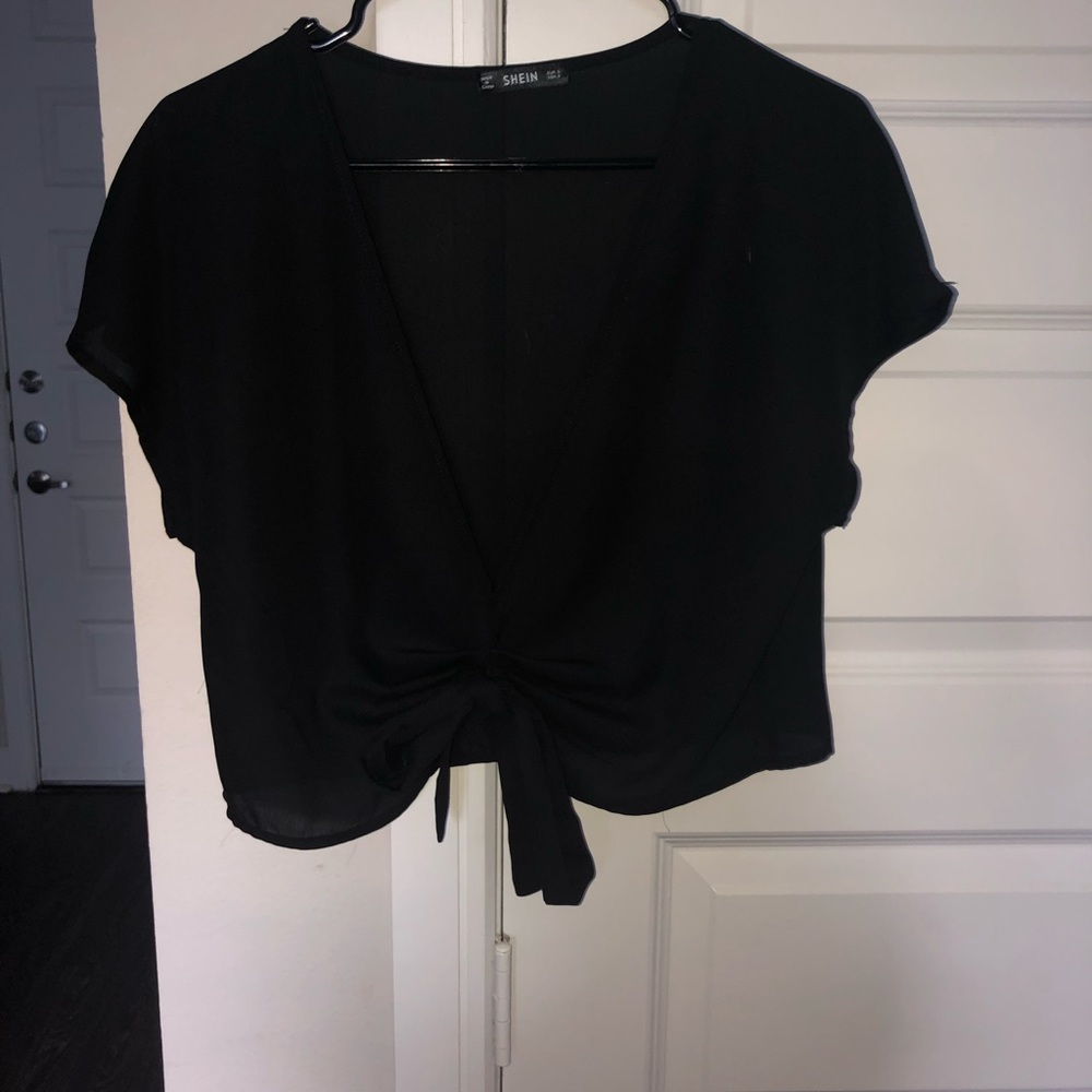 Black v-neck top with tie